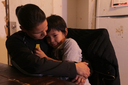 Photos for  Mary Agnes feature piece on CFS, Nelson House First Nation. Shirley Swanson, who at one time had her kids apprehended is now a inspiration to other mothers in the community after getting her life back on track and her kids back.  Photo of Shirley Swanson holding her youngest son, Zacheus -6yrs.     Nov 04, 2015 Ruth Bonneville / Winnipeg Free Press