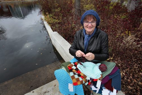 Volunteers - Val Paulley, a retired nurse and avid knitter, is the organizer of Chase the Chill.  The organization hangs hand knit scarves up in Old Market Square on the first Saturday in December each year for those in need of warmth this winter.     Nov 12, 2015 Ruth Bonneville / Winnipeg Free Press