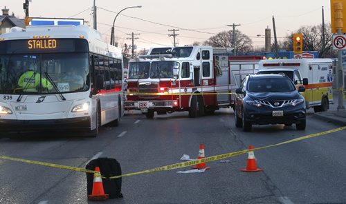 Winnipeg Fire Paramedics on the scene after a pedestrian was struck on St. Mary's Rd. at Vivian Ave. Friday morning. All south bound lanes were closed. Wayne Glowacki / Winnipeg Free Press Nov. 13   2015
