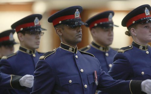 Winnipeg Police Service Recruit Class #158 Friday afternoon at Minto Armoury  21 officers graduated from recruit class #158 and #158 Lateral-Nov 13, 2015   (JOE BRYKSA / WINNIPEG FREE PRESS)