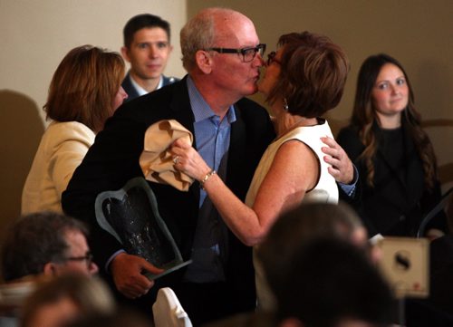 The Association of Fundraising Professionals Manitoba (AFP) will recognize outstanding philanthropists, volunteer fundraisers, corporations, and foundations for their generosity and thoughtful contributions at the Manitoba Philanthropy Awards luncheon being held at the Metropolitan Event Centre today. Outstanding Philanthropist Doug Harvey kisses his supportive wife Jan Shute. BORIS MINKEVICH / WINNIPEG FREE PRESS  NOV 13, 2015