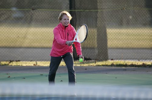 Naomi Gerrard plays tennis with her husband Jon Friday afternoon at Tuxedo Tennis club after the club decided to keep one of the nets up due to the mild weather.  They plan on putting back up another net for the weekend because of the mild weekend forecast. Standup photo  Nov 13, 2015 Ruth Bonneville / Winnipeg Free Press
