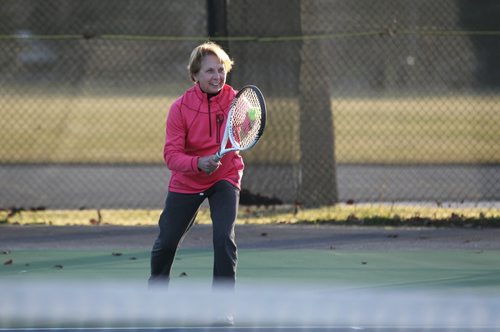 Naomi Gerrard plays tennis with her husband Jon Friday afternoon at Tuxedo Tennis club after the club decided to keep one of the nets up due to the mild weather.  The club plans on setting back up another net for the weekend because of the continuing warm weather.   Standup photo  Nov 13, 2015 Ruth Bonneville / Winnipeg Free Press