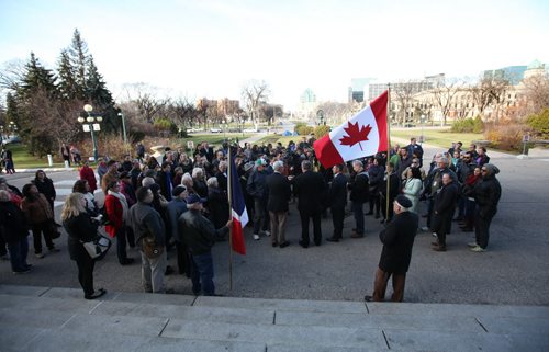 French Honourary Consul Bruno Burnichon, Mayor Bowman and Premier Selinger  talk about the Paris attacks to the press and concerned citizens who gathered on the steps of  the Manitoba legislature for vigil  Saturday afternoon.    Nov 14, 2015 Ruth Bonneville / Winnipeg Free Press