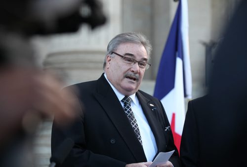 French Honourary Consul Bruno Burnichon passionately  speaks about the Paris attacks to the press concerned and concerned citizens who gathered on the steps of  the Manitoba legislature for vigil  Saturday afternoon.   Nov 14, 2015 Ruth Bonneville / Winnipeg Free Press