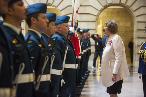 Lieutenant Governor of Manitoba Janice Filmon inspects the ranks at the Manitoba Legislative Building before the throne speech in Winnipeg on Monday, Nov. 16, 2015.   (Mikaela MacKenzie/Winnipeg Free Press)