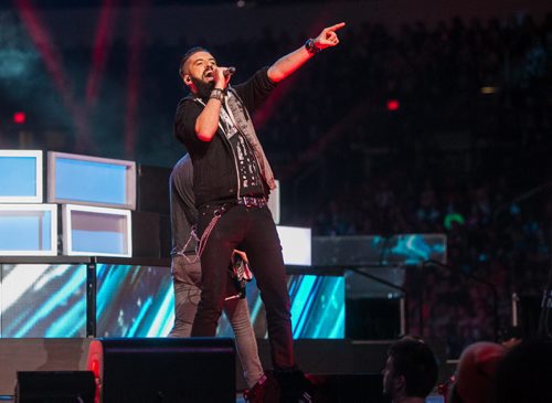 Around 16,000 Manitoba students and teachers take in WE Day Manitoba at the MTS Centre Monday, where inspirational speakers and performers helped celebrate youth making a difference in their communities. Robb Nash, singer, speaker and founder of The Robb Nash Project performs on stage at WE Day. 151116 - Monday, November 16, 2015 -  MIKE DEAL / WINNIPEG FREE PRESS