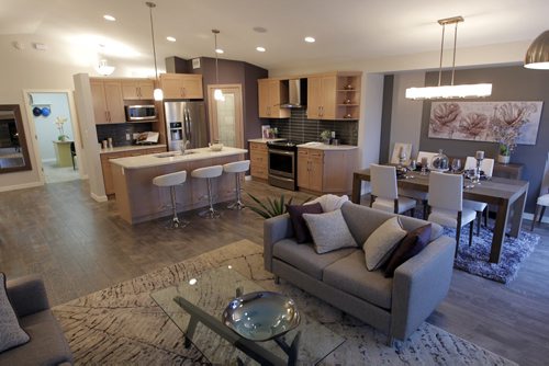 NEW HOME - 11 Cotswold Place in River Park South. View of Kitchen and eating area from the back living room. BORIS MINKEVICH / WINNIPEG FREE PRESS  NOV 16, 2015