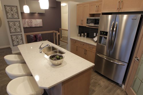 NEW HOME - 11 Cotswold Place in River Park South. Kitchen island. BORIS MINKEVICH / WINNIPEG FREE PRESS  NOV 16, 2015