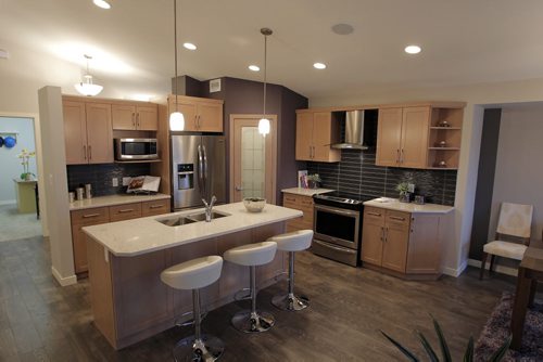 NEW HOME - 11 Cotswold Place in River Park South. View of kitchen and island. BORIS MINKEVICH / WINNIPEG FREE PRESS  NOV 16, 2015