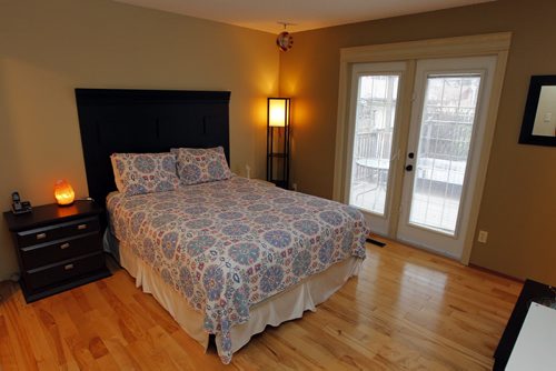 USED HOME - 87 Rizzuto Bay in Mission Gardens. Hardwoods in the master bedroom with walkout to hot tub. BORIS MINKEVICH / WINNIPEG FREE PRESS  NOV 17, 2015