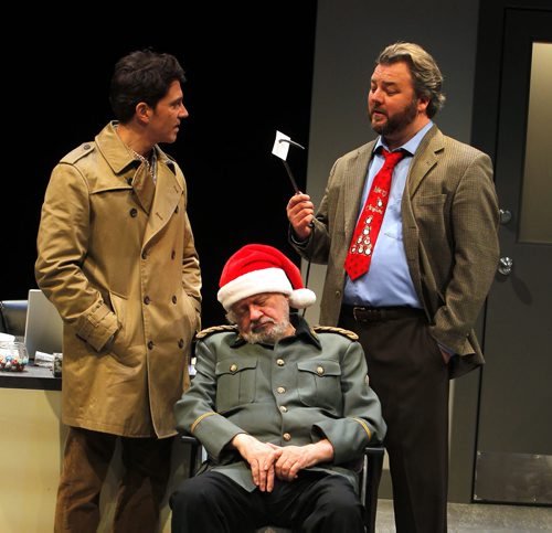 Butcher media call at Prairie Theatre Exchange, Portage Place - Butcher is a play about a man who shows up drugged at a police station dressed in a foreign military uniform and a Santa hat with a card saying arrest me hung around his neck. Written by Nicolas Billon (Iceland), its a thriller touching on war crimes. Left to right -Paul Essiembre as Hamilton Barnes, Harry Nelken as the old man, and Cory Wojcik as inspector Lamb. BORIS MINKEVICH / WINNIPEG FREE PRESS NOV 18, 2015