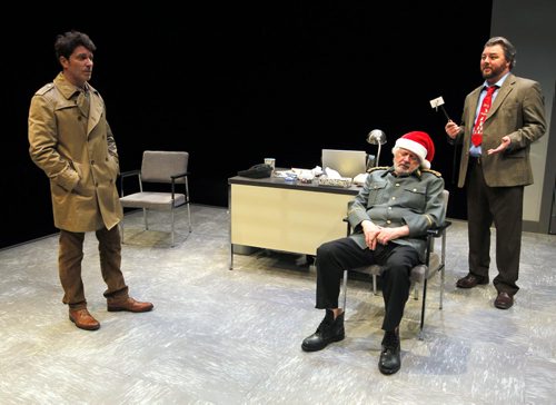 Butcher media call at Prairie Theatre Exchange, Portage Place - Butcher is a play about a man who shows up drugged at a police station dressed in a foreign military uniform and a Santa hat with a card saying arrest me hung around his neck. Written by Nicolas Billon (Iceland), its a thriller touching on war crimes. Left to right -Paul Essiembre as Hamilton Barnes, Harry Nelken as the old man, and Cory Wojcik as inspector Lamb. BORIS MINKEVICH / WINNIPEG FREE PRESS  NOV 18, 2015