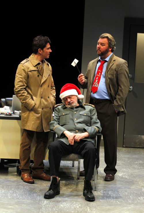 Butcher media call at Prairie Theatre Exchange, Portage Place - Butcher is a play about a man who shows up drugged at a police station dressed in a foreign military uniform and a Santa hat with a card saying arrest me hung around his neck. Written by Nicolas Billon (Iceland), its a thriller touching on war crimes. Left to right -Paul Essiembre as Hamilton Barnes, Harry Nelken as the old man, and Cory Wojcik as inspector Lamb. BORIS MINKEVICH / WINNIPEG FREE PRESS  NOV 18, 2015