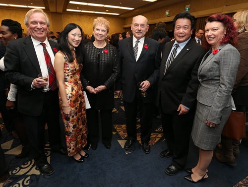 L-R: Dwight MacAulay (chief protocol officer for the province), Melinda Lee (co-chair of the gala committee), Hon. Pearl McGonigal (gala committee member), Arnold Naimark (previous honoree), Ben Lee (gala committee member) and Sharon Blady (Manitoba Health Minister) at the 2015 Golden Dragon Citizen of the Year Gala at the RBC Convention Centre Winnipeg on Nov. 10, 2015. Photo by Jason Halstead/Winnipeg Free Press
