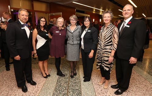L-R: Carmine Militano (Holy Names board member), Kaitlyn Militano (Holy Names board member), Heather Maxwell (Holy Names board member), Lesley Sacouman (executive director of the Holy Names House of Peace), Maria Battaglia (Holy Names board member and dinner chair), Marian Deegan (Holy Names board member) and Ken Loscerbo (Holy Names board member), at the Holy Names House of Peace Welcome Home Dinner at the RBC Convention Centre Winnipeg on Nov. 5. Photo by Jason Halstead/Winnipeg Free Press