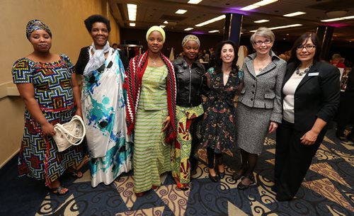 L-R: Holy Names House of Peace residents Jeanine Nibitanga, Emilianne Minani, Selina Dukundane, Tuyisenge Everiane, Carolyn Lindner (keynote speaker), Lesley Sacouman (executive director of the Holy Names House of Peace) and Maria Battaglia (Holy Names board member and dinner chair) at the Holy Names House of Peace Welcome Home Dinner at the RBC Convention Centre Winnipeg on Nov. 5. Photo by Jason Halstead/Winnipeg Free Press