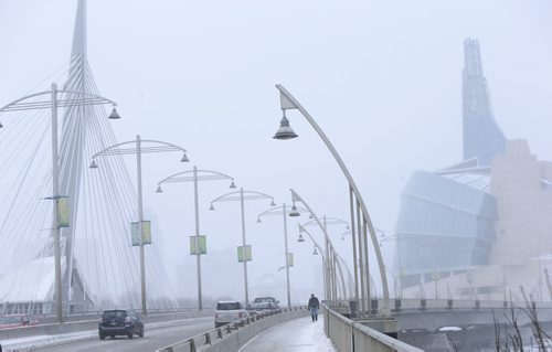 The view from the Provencher Bridge on a blustery snowy Thursday afternoon. For Randy Turner weather story Wayne Glowacki / Winnipeg Free Press Nov. 19   2015