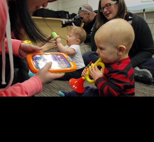 Four new child-care centres in schools as part of commitment to create 12,000 new spaces - Daycare kids press conference. Children, parents, and day care workers play around before Manitoba Govt. daycare announcement. Photo taken at Manitoba Institute of Trades and Technology (MITT). BORIS MINKEVICH / WINNIPEG FREE PRESS  NOV 20, 2015