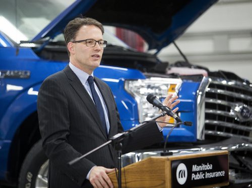 Paul Vogt, president of Red River College, announces plans for a new Centre of Excellence in automotive research and training in Winnipeg on Friday, Nov. 20, 2015.   (Mikaela MacKenzie/Winnipeg Free Press)