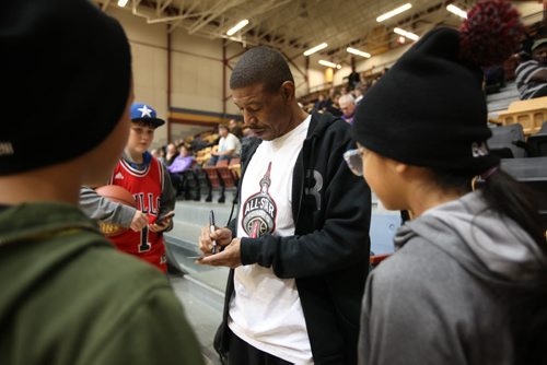 Former Toronto Raptor Muggsy Bogues signs autographs for Draiven Garcia - 11yrs (left) and his sister Memphis -10yrs (glasses) at U of M Saturday as part of the nationwide NBA All-Star 2016 program that will bring the excitement of All-Star to 14 Canadian cities in 10 provinces from November through February. Sports Standup photo Nov 21, 2015 Ruth Bonneville / Winnipeg Free Press