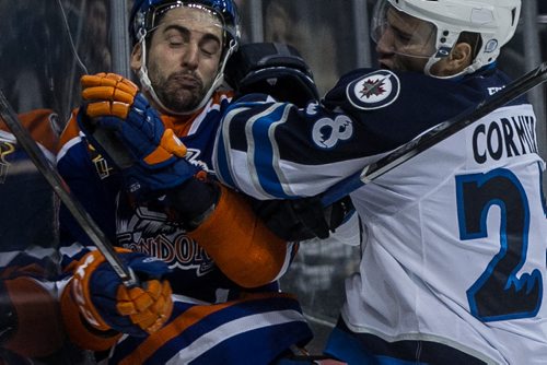 Manitoba Moose' Patrice Cormier (28) checks Bakersfield Condors' Joey LaLeggia (13) during second period AHL action at MTS Centre Sunday afternoon. 151122 - Sunday, November 22, 2015 -  MIKE DEAL / WINNIPEG FREE PRESS