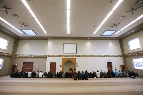 November 22, 2015 - 151122  -  Men pray during an open house at Winnipeg's Grand Mosque Sunday, November 22, 2015.  John Woods / Winnipeg Free Press