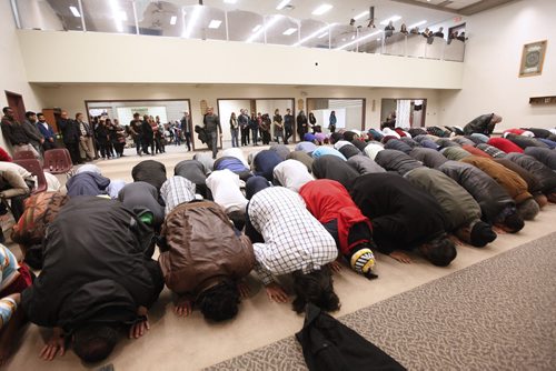 November 22, 2015 - 151122  -  Attendees observe a prayer service during an open house at Winnipeg's Grand Mosque Sunday, November 22, 2015.  John Woods / Winnipeg Free Press