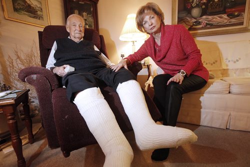 November 23, 2015 - 151123  -  Sharon Jarzombek is photographed with her father Bert Friesen who was injured when a Concordia Hospital nurse ripped four EKG connections from his legs Monday, November 23, 2015. John Woods / Winnipeg Free Press