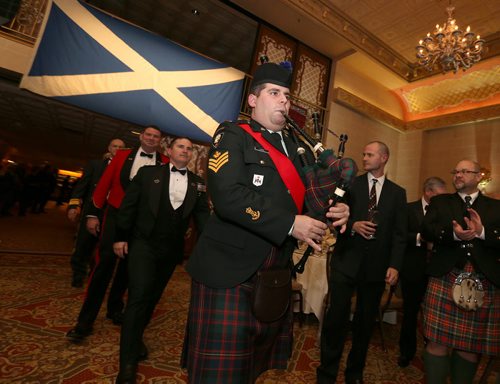 A bagpiper pipes in members of the head table at the St. Andrews Society of Winnipeg's 145th annual celebration dinner on Nov. 20 at the Fort Garry Hotel.  Photo by Jason Halstead/Winnipeg Free Press RE: Social Page, Nov. 28, 2015