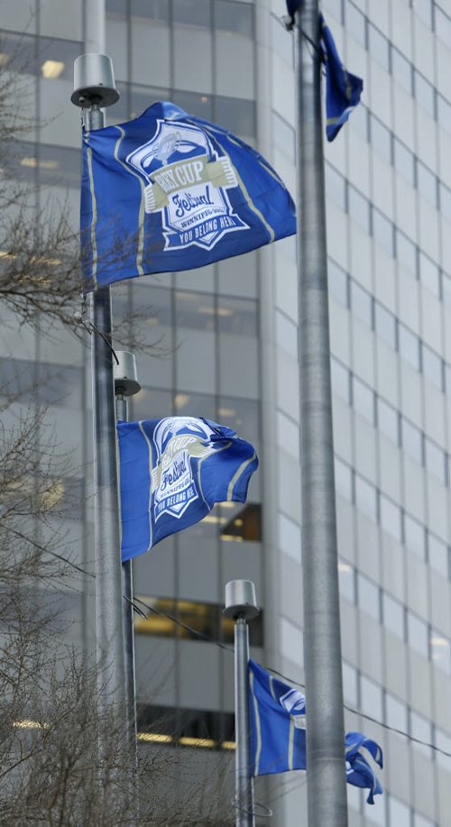 Grey Cup flags flying around Portage Ave. and Main St.  Wayne Glowacki / Winnipeg Free Press Nov. 24   2015