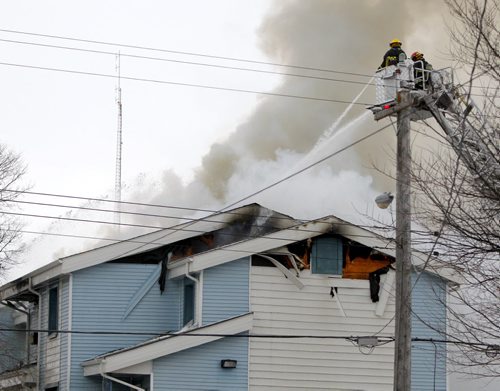 Fire scene on Dufferin. BORIS MINKEVICH / WINNIPEG FREE PRESS  NOV 23, 2015