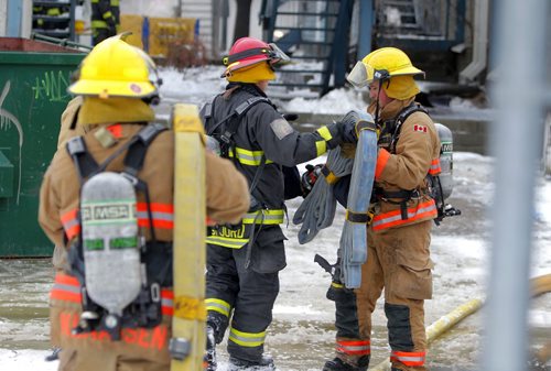 Fire scene on Dufferin. BORIS MINKEVICH / WINNIPEG FREE PRESS  NOV 23, 2015