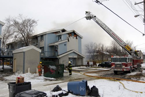 Fire scene on Dufferin. BORIS MINKEVICH / WINNIPEG FREE PRESS  NOV 23, 2015