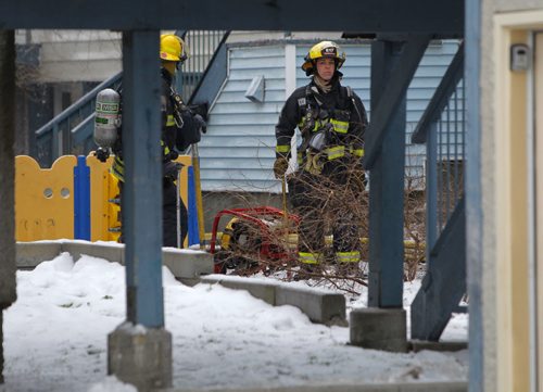 Fire scene on Dufferin. BORIS MINKEVICH / WINNIPEG FREE PRESS  NOV 23, 2015