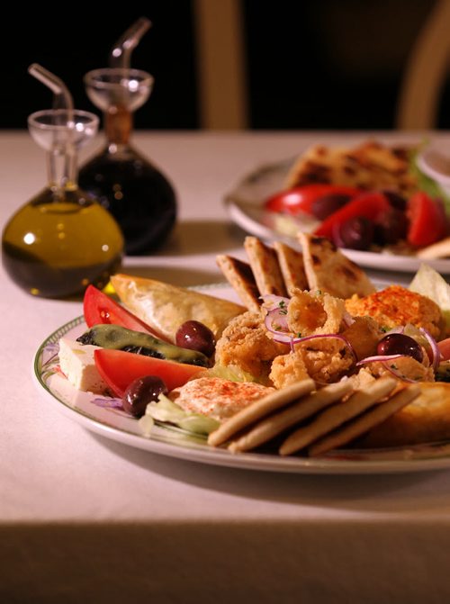 ENT - Restaurant reviews,  story is about appetizers that can work as full (small) meals. Homer's Restaurant, pikilia platter (front) & tarama salata. Nov 24, 2015 Ruth Bonneville / Winnipeg Free Press