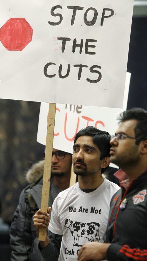 Hassan Abbas and other International students, students and faculty in a 'Stop the Cuts' rally before a board of governors meeting at the University of Manitoba.   November 24, 2015 Mike Deal / Winnipeg Free Press