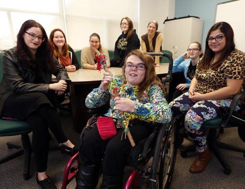 United Way feature. In centre, Jordana Kilgour,18, holds the "talking stick" with members of her Circle of Friends program at St. James Collegiate. This is a weekly session where Jordana learns to interact with people her own age.    Jessica Botelho-Urbanski  story  Wayne Glowacki / Winnipeg Free Press Nov. 24   2015