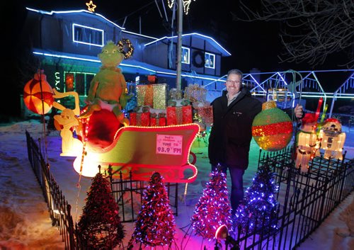 Michael Geiger-Wolf poses in front of his house at 18 Mildred Street. It's a fundraiser xmas christmas lights thing for cancer. BORIS MINKEVICH / WINNIPEG FREE PRESS  NOV 23, 2015