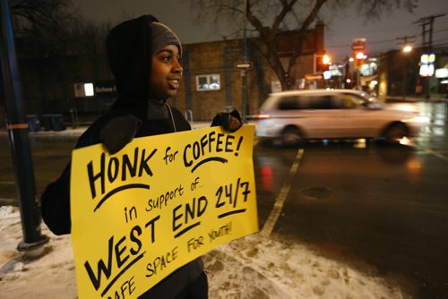 Omar Shariff,14, was out with other volunteers handing out information, muffins and coffee at the launch of the West End 24/7 Safe Space fundraising campaign on Maryland St. and Ellice St. Wednesday morning. Bill Redekop story Wayne Glowacki / Winnipeg Free Press Nov. 25   2015