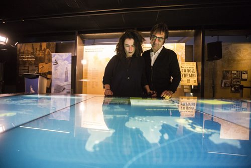 Canadian movie director Atom Egoyan and actor Arsinée Khanjian look at the exhibits in a posed photo op after speaking at the Canadian Museum of Human Rights in Winnipeg on Wednesday, Nov. 25, 2015.   (Mikaela MacKenzie/Winnipeg Free Press)
