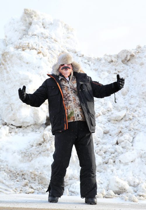 Free Press humour columnist, Doug Speirs, shows off his new layered winter clothing from Cabela's showing how to stay warm and cozy while attending this year's Grey Cup in Winnipeg.   See Speirs column with video.  Nov 25, 2015 Ruth Bonneville / Winnipeg Free Press