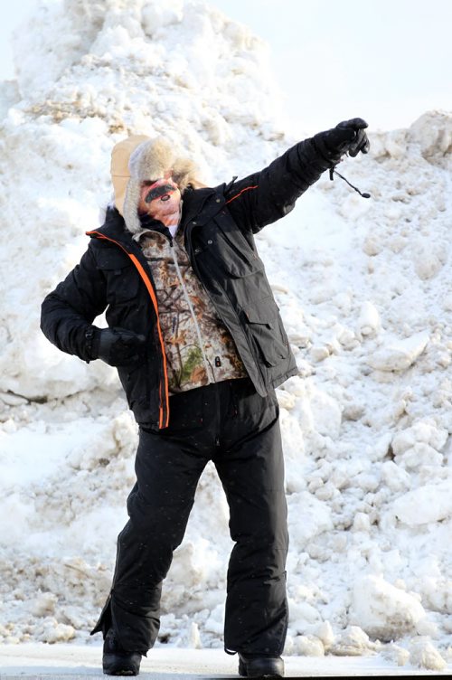 Free Press humour columnist, Doug Speirs, shows off his new layered winter clothing from Cabela's showing how to stay warm and cozy while attending this year's Grey Cup in Winnipeg.   See Speirs column with video.  Nov 25, 2015 Ruth Bonneville / Winnipeg Free Press