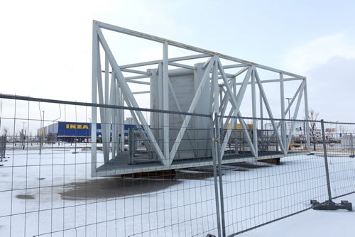 IKEA's metal girders sit on the ground in their parking lot.  See story on IKEA sign, Nov 25, 2015 Ruth Bonneville / Winnipeg Free Press