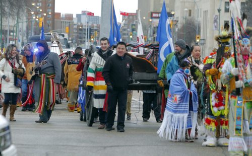 The CFL Grey Cup arrives at the Manitoba Legislature by Red River Cart. Metis , RCMP, and Aboriginal paraded the cup to the Leg in an official event. BORIS MINKEVICH / WINNIPEG FREE PRESS  NOV 25, 2015