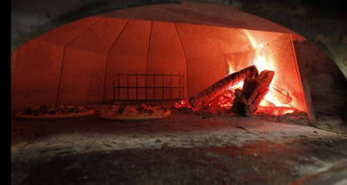 THIS CITY - Santa Ana Pizzeria & Bistro. Wood fired pizza oven is powered by oak hardwood. BORIS MINKEVICH / WINNIPEG FREE PRESS  NOV 25, 2015