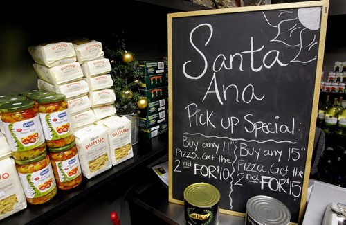 THIS CITY - Santa Ana Pizzeria & Bistro. Various interior shots of decor.  This place sells specialized groceries too. BORIS MINKEVICH / WINNIPEG FREE PRESS  NOV 25, 2015