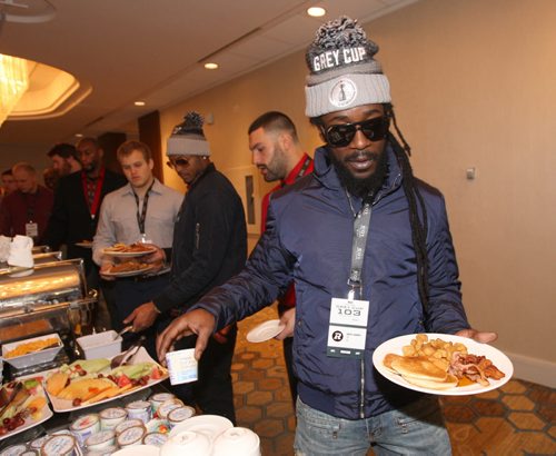 Ottawa Redblacks Abdul Kenneh grabs some breakfast  at Grey Cup East Division Champions Media Breakfast at the Delta Hotel in downtown Winnipeg -See storyNov 26, 2015   (JOE BRYKSA / WINNIPEG FREE PRESS)