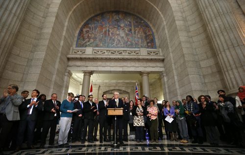 Premier Greg Selinger announces plans to welcome Syrian refugees to the province along with MLAs and members of refugee settlements organizations in the Manitoba Legislative building Thursday. Carol Sanders story  Wayne Glowacki / Winnipeg Free Press Nov. 26    2015