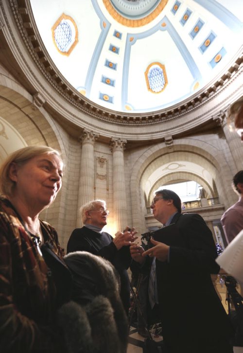 From left Deva-Marie Beck, as partner Wayne Kines speaks to Ben Rempel after the provincial announcement to welcome Syrian refugees to the province held  in the Manitoba Legislative building Thursday. Carol Sanders story  Wayne Glowacki / Winnipeg Free Press Nov. 26    2015